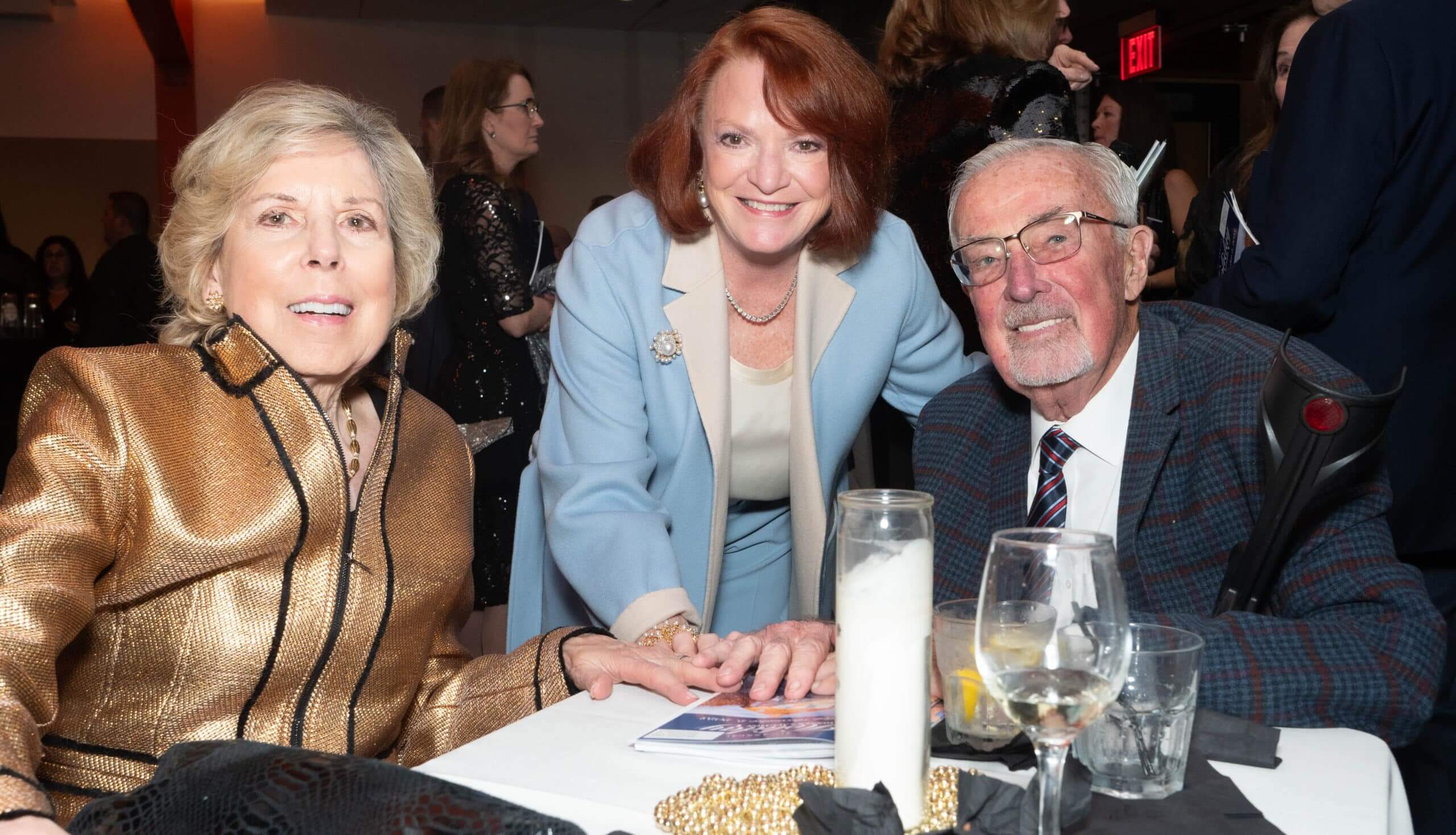 Renee Klapperman, Jamie Musselman and Jim Edwards at the 2023 Holiday Dinner & Auction