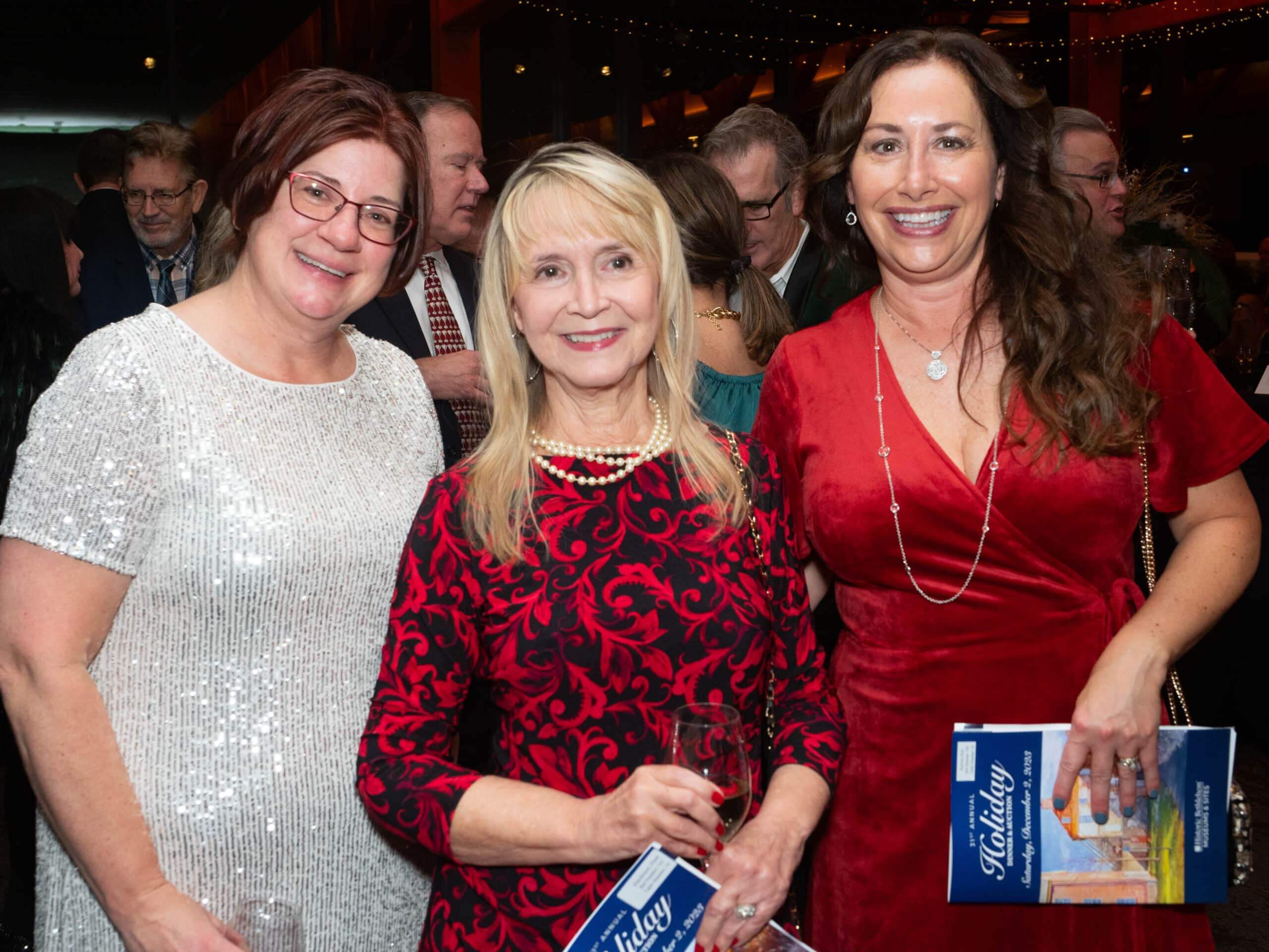 Karen Kaar, Diane Hutchinson and Kim Reybitz together at the Holiday Dinner & Auction