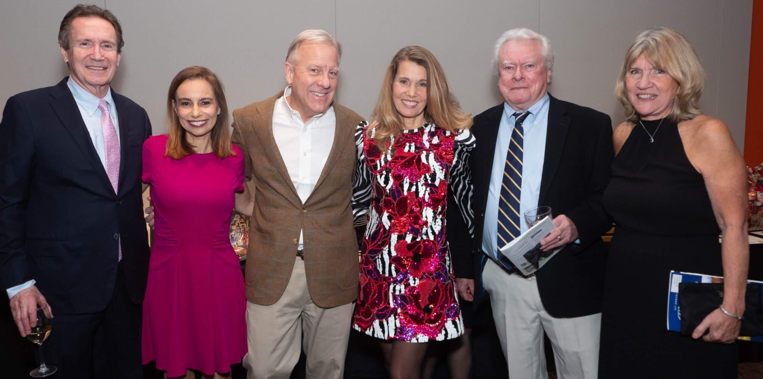 Nancy Ahlum and other guests at the Holiday Dinner & Auction