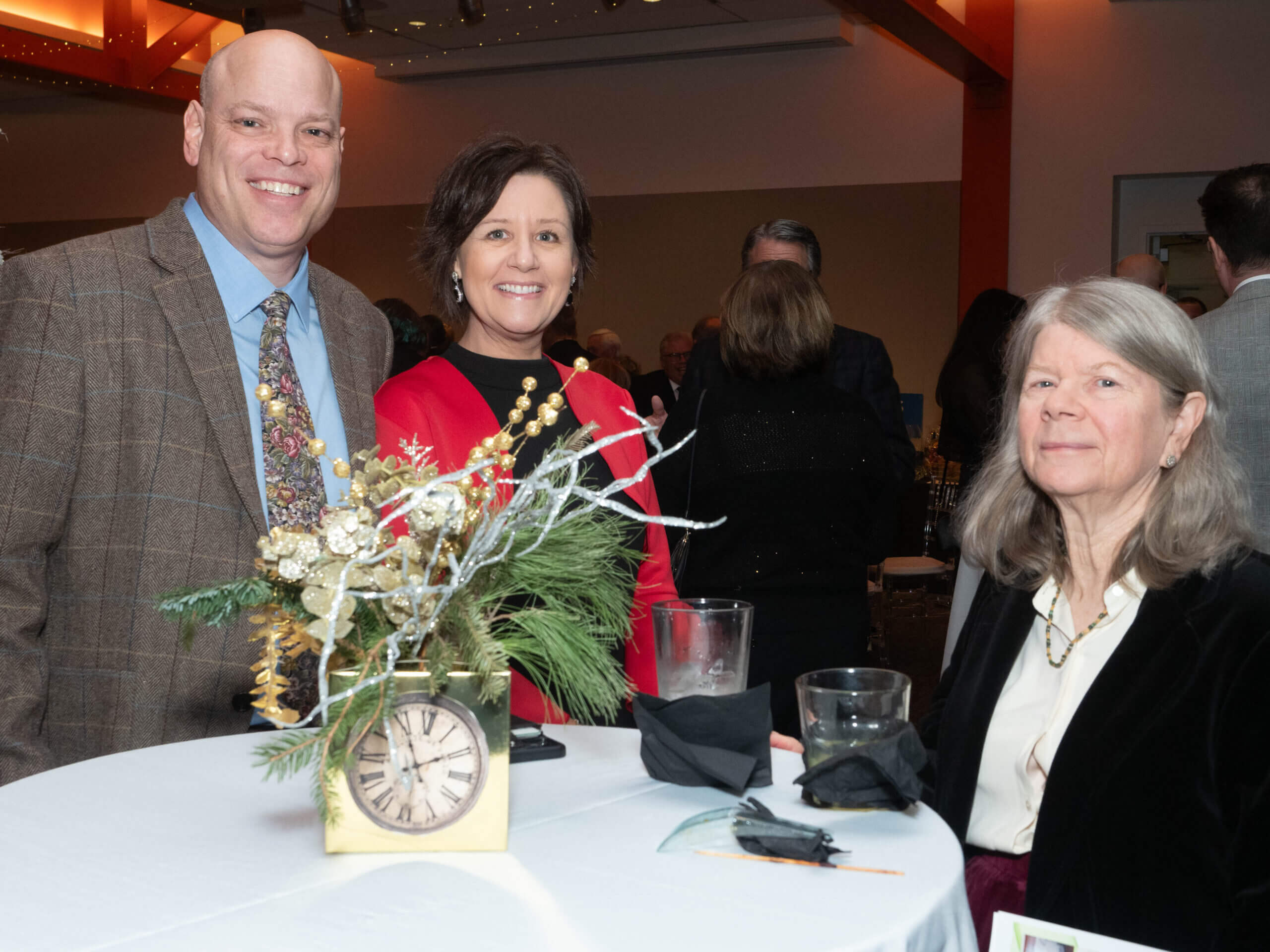 Scott & Robyn Bingham and Peg Church at the Holiday Dinner & Auction