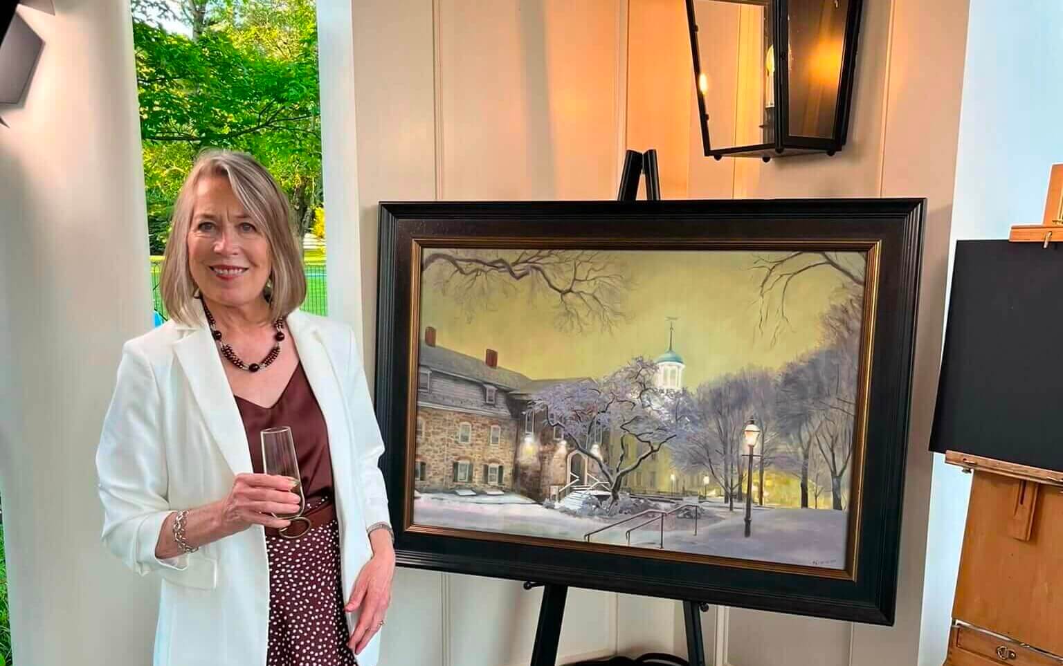 Sandy Corpora with 2024 Holiday Dinner Featured Painting at Rooms to View Preview Party
