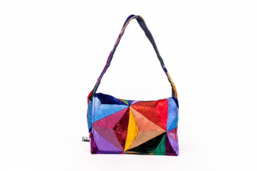 A rainbow, geometric quilted purse