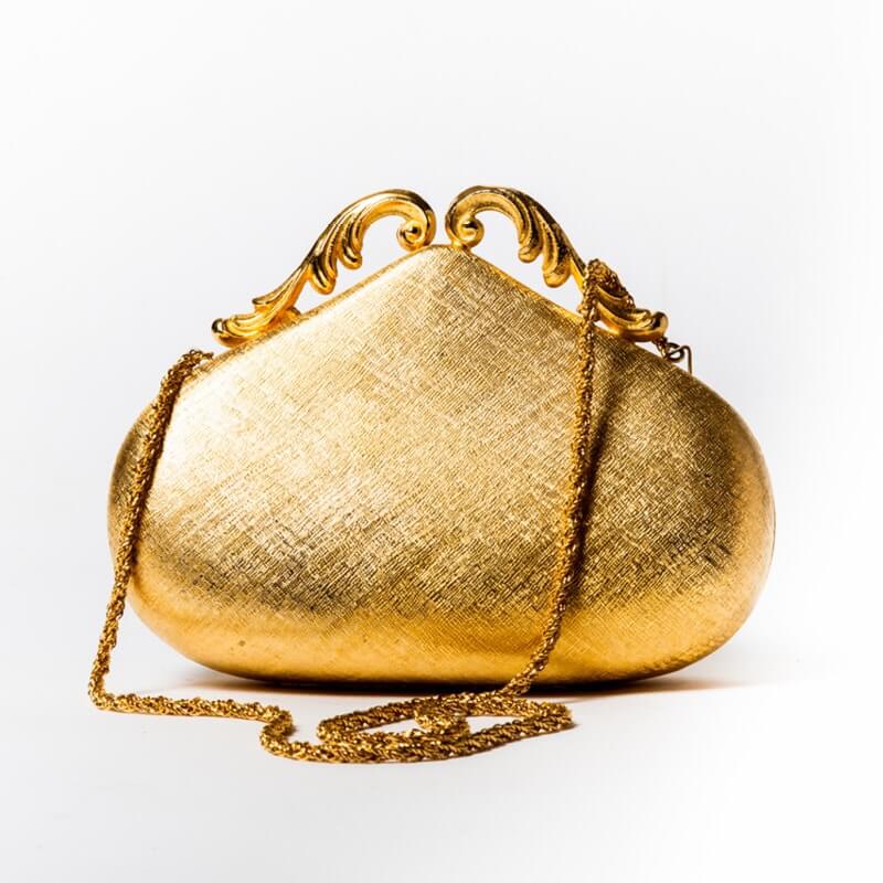 An ornate, golden clutch