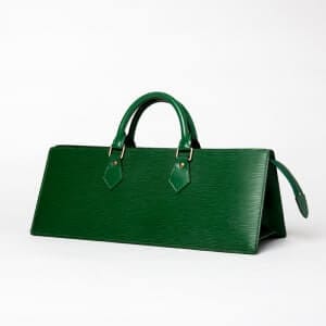 A green, pyramid shaped purse